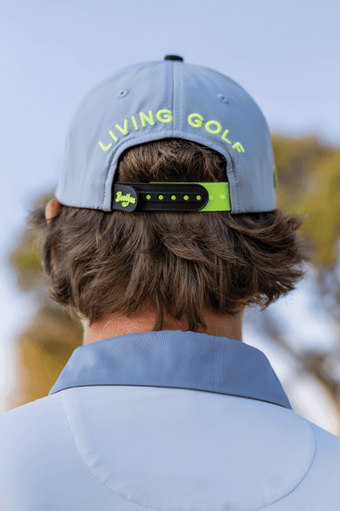 BooYaa Premium Golf Cap - BOLD GREY, gray and navy cap with neon yellow trim, on-model back view