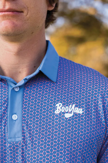 Fowler Golf Polo, blue and coral geometric print golf shirt, on-model front detail