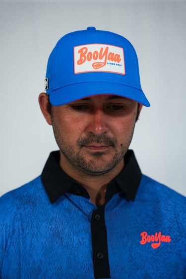 Gators Blue Hat, blue golf hat with orange underbrim, on-model front view