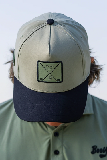 Stealth Golf Hat, sage green and black golf hat, on-model front view