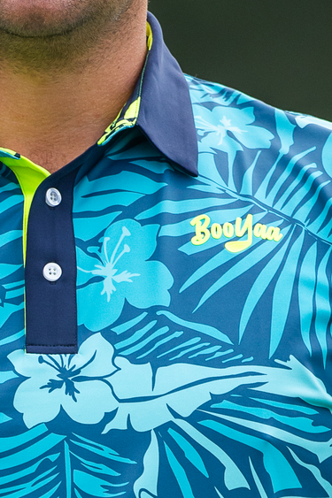 Azure Golf Polo, blue and neon green floral golf shirt, on-model front detail