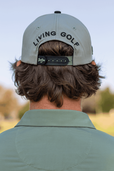 BooYaa Premium Golf Cap - STEALTH, gray and navy cap, on-model back view