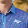 Fowler Golf Polo, blue and coral geometric print golf shirt, on-model front detail