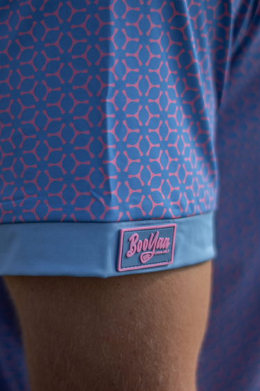 FOWLER - PREMIUM LIFESTYLE COLLECTION 2026 - BOOYAA SHIRT, blue with pink print, sleeve cuff logo close-up