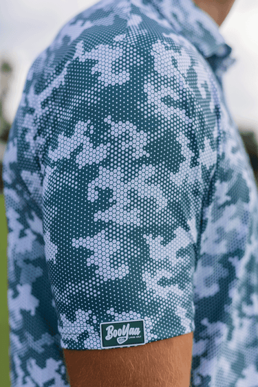 ACRES - PREMIUM LIFESTYLE COLLECTION 2026 - BOOYAA GOLF SHIRT, blue and gray, sleeve logo close-up