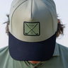 Stealth Golf Hat, sage green and black golf hat, on-model front view