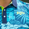 Azure Golf Polo, blue and neon green floral golf shirt, on-model front detail