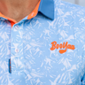 Hawaii Golf Polo, light blue, white and orange golf shirt, on-model front detail